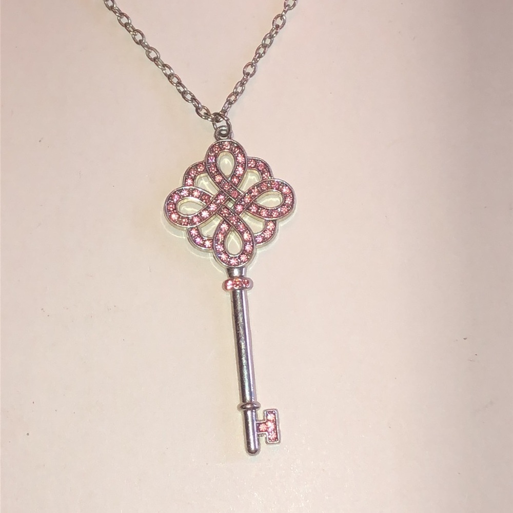 Silver Tone Key Pendant Necklace with Pink Accents